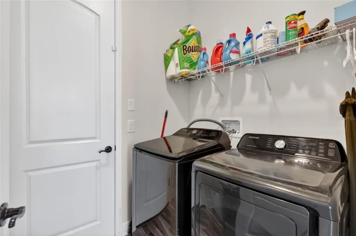 Laundry with Door to 3 Car Tandem Garage