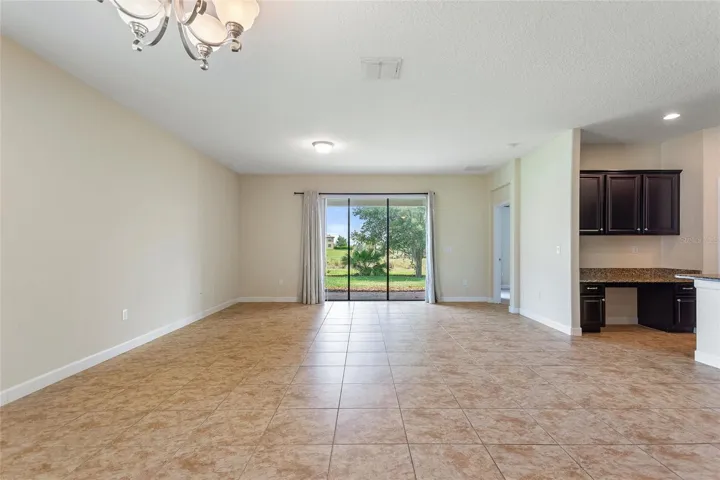 Family room with sliding glass door to rear patio.