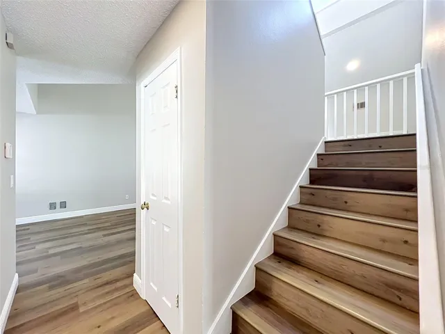 Beautiful wood work leading upstairs