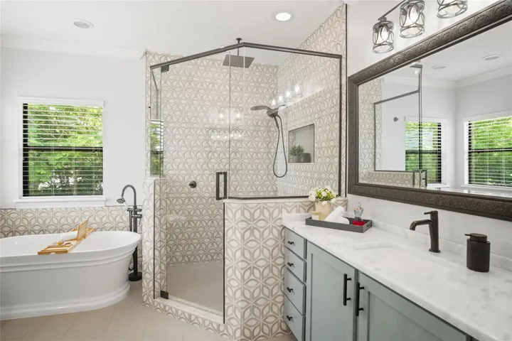 Elegance awaits you in the primary ensuite bathroom.