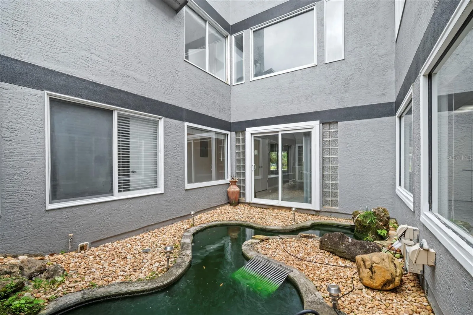 Open Air Interior Atrium with Koi and Turtle Pond