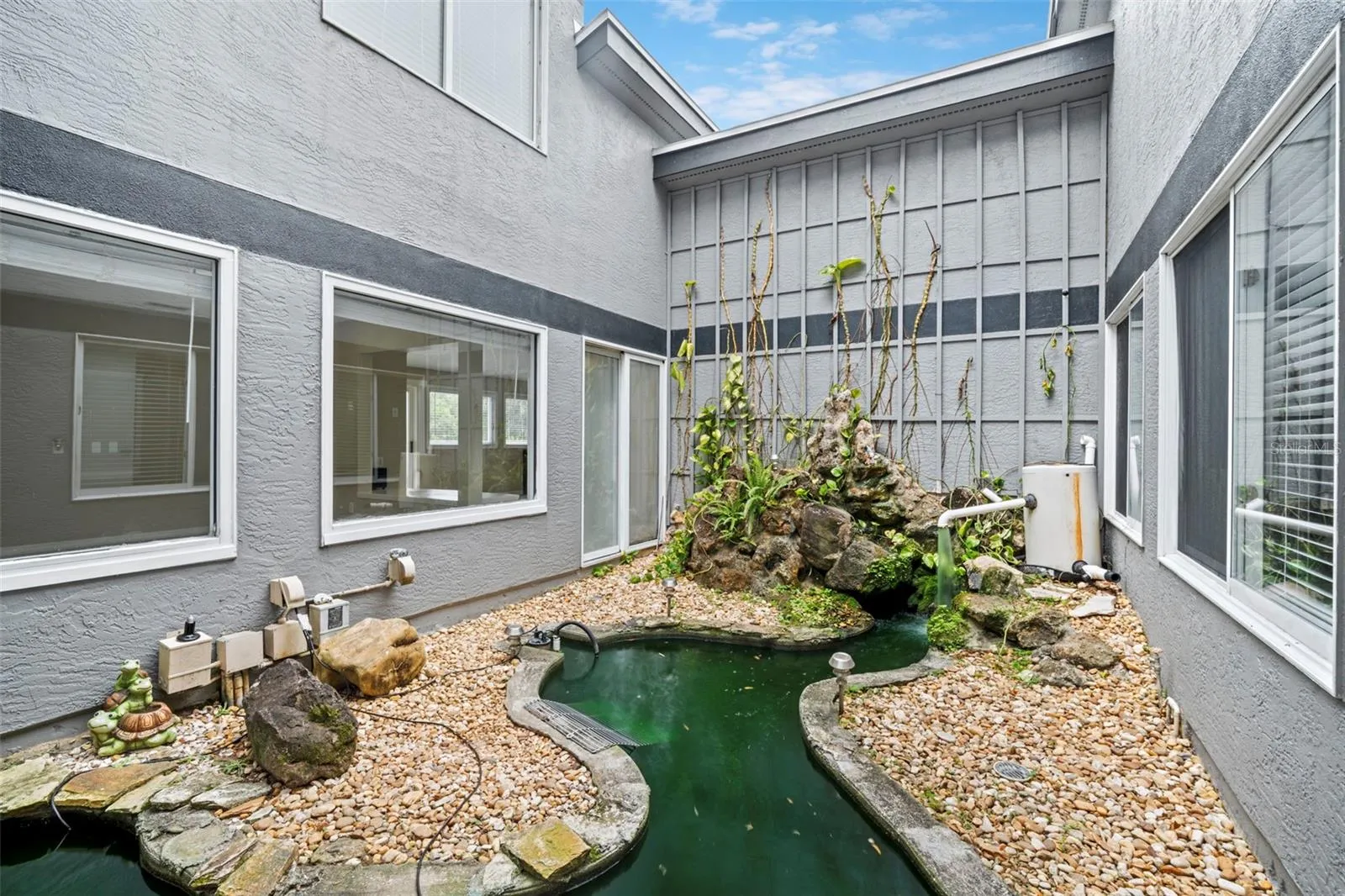 Open Air Interior Atrium with Koi and Turtle Pond