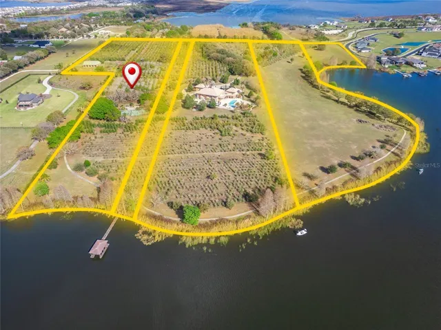 This parcel includes the tennis court, the barn, detached garage.