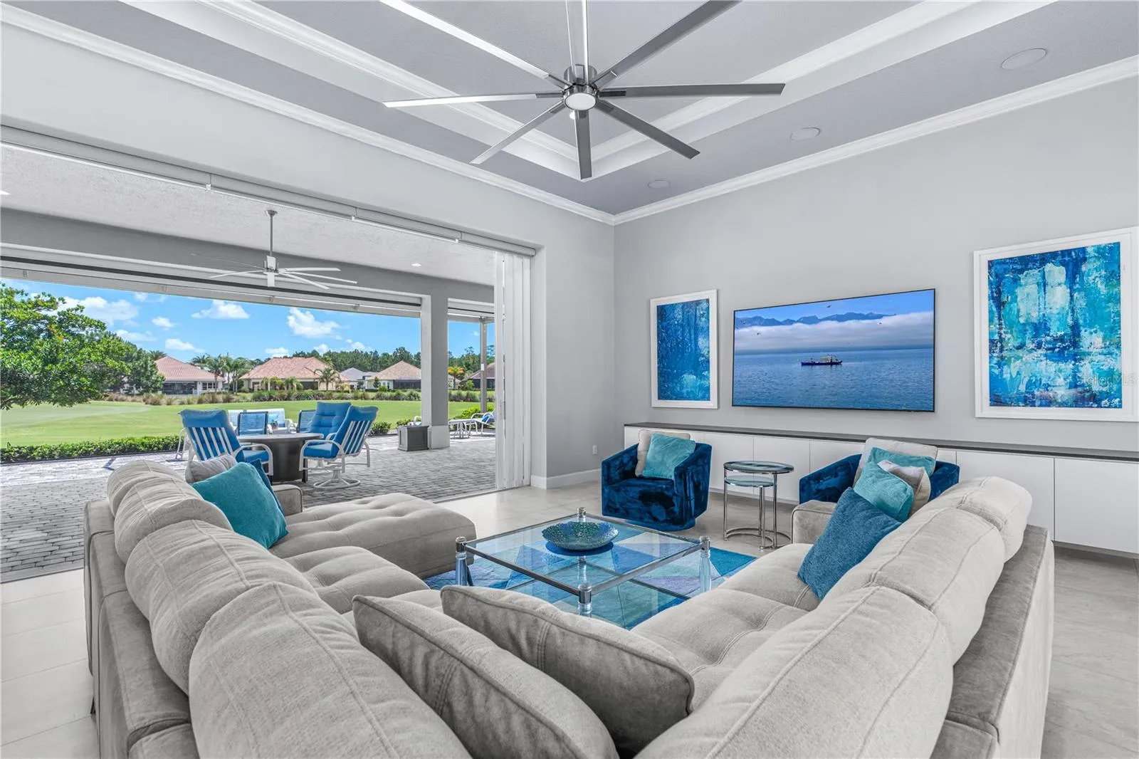 Views of the Lanai & Golf Course through Vanishing Sliders