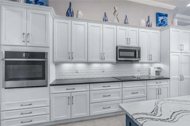 Gourmet Kitchen Extensive Custom Cabinetry