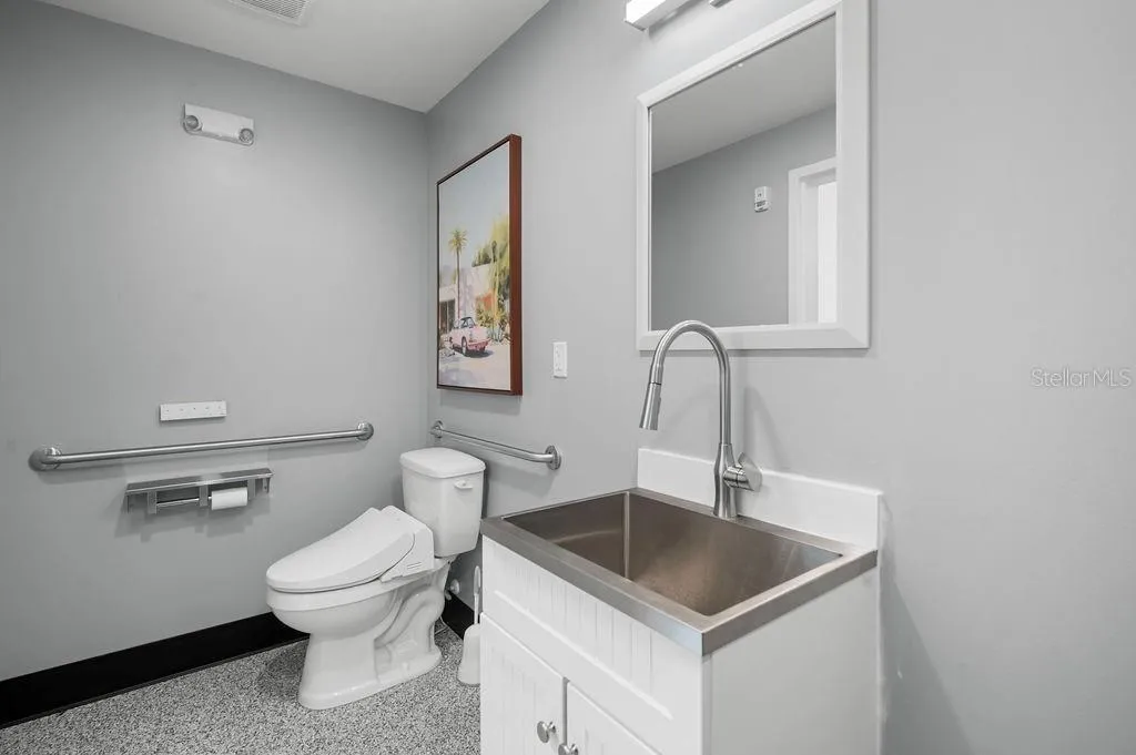 Upgraded private half bath in unit