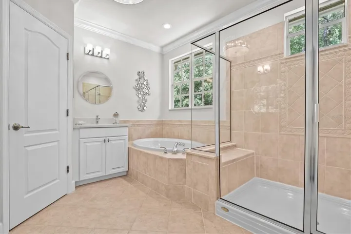 Primary Bathroom with Jetted Tub and large Walk in Shower