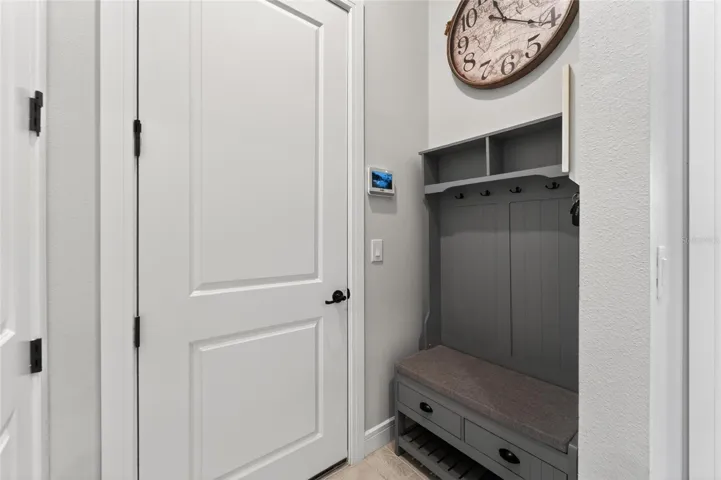 Drop off zone into home from garage