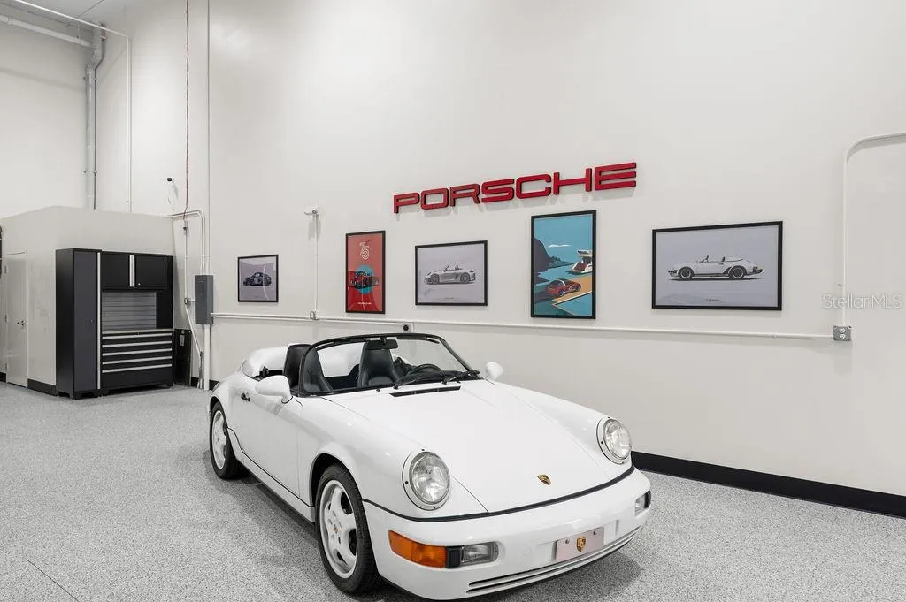 Car collection pictured is not included in the sale of this unit