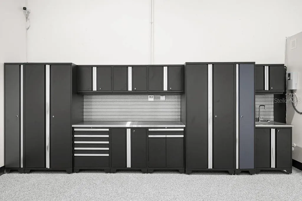 New Age™ Performance Series cabinetry system with stainless work sink conveys