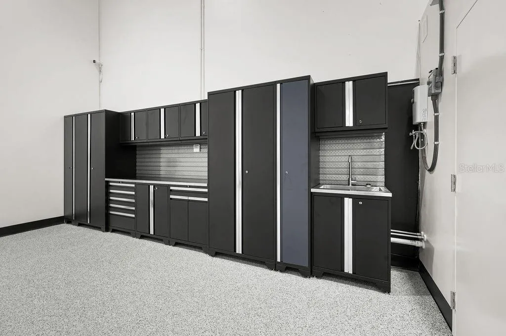 New Age™ Performance Series cabinetry system with stainless work sink conveys