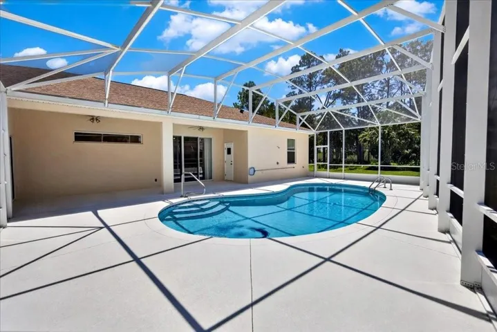 Enjoy the outdoors all year long! New screened pool enclosure in 2025.