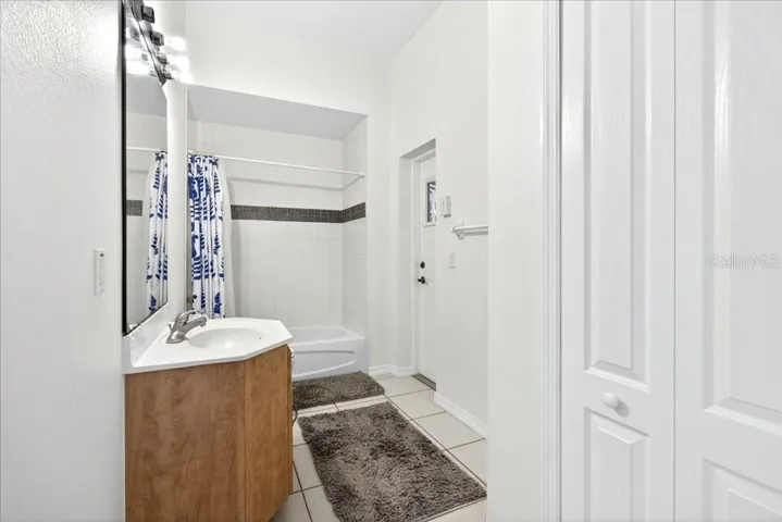 Bathroom #2 with direct access to the pool area.
