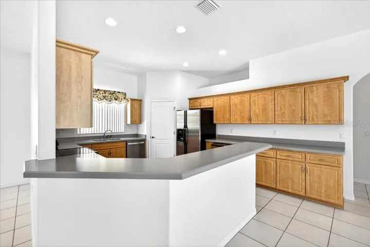 Large kitchen with ample cabinet & counter space!