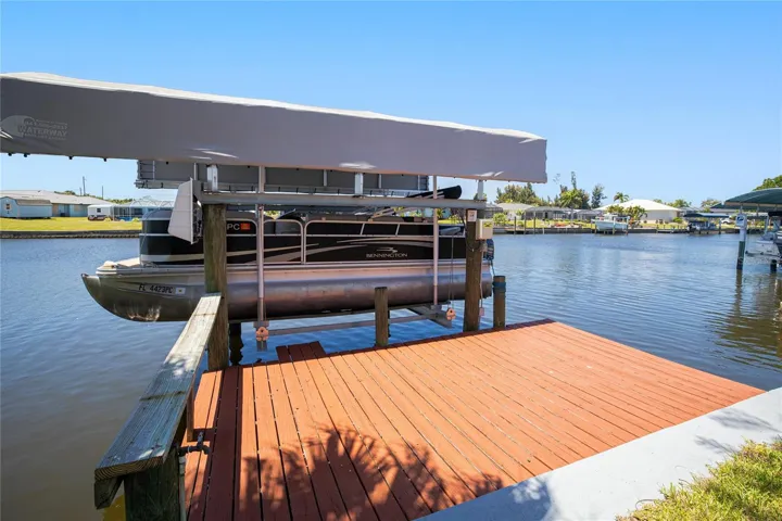 Boat lift and cover at your very own dock