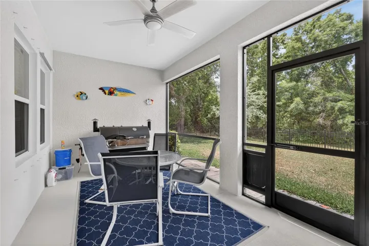 Plenty of room to entertain on you screened in back porch
