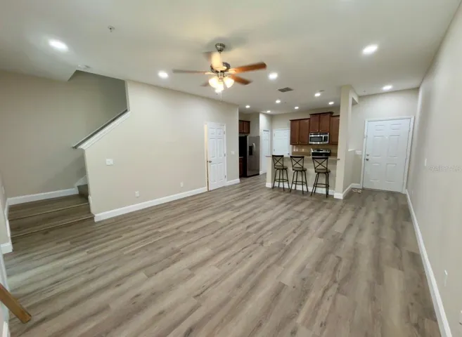 Large living room that opens to the spacious kitchen
