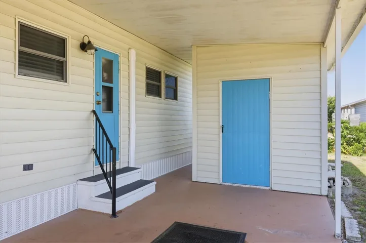 Create your outdoor living room under the Carport