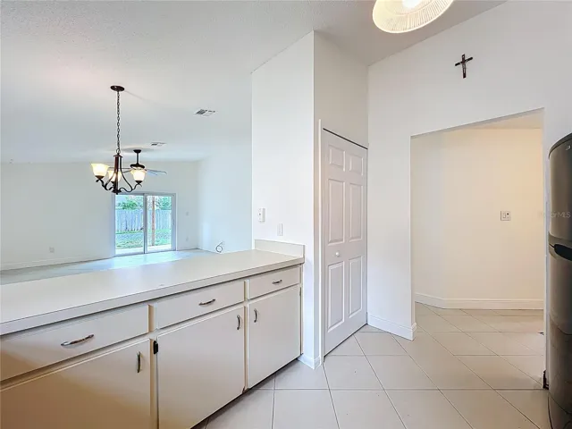 kitchen overlooking living area