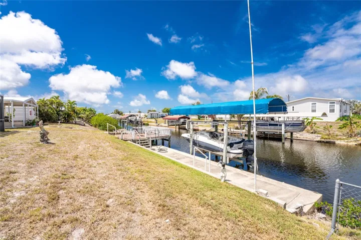 Concrete seawall, dock, and covered lift!