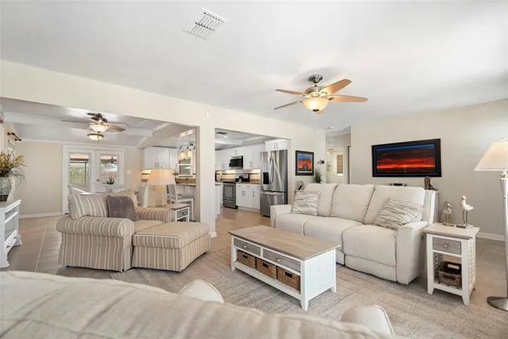 The open living and dining areas blend into an updated kitchen.