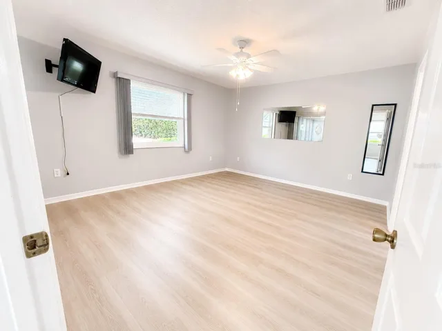 Primary bedroom with new flooring