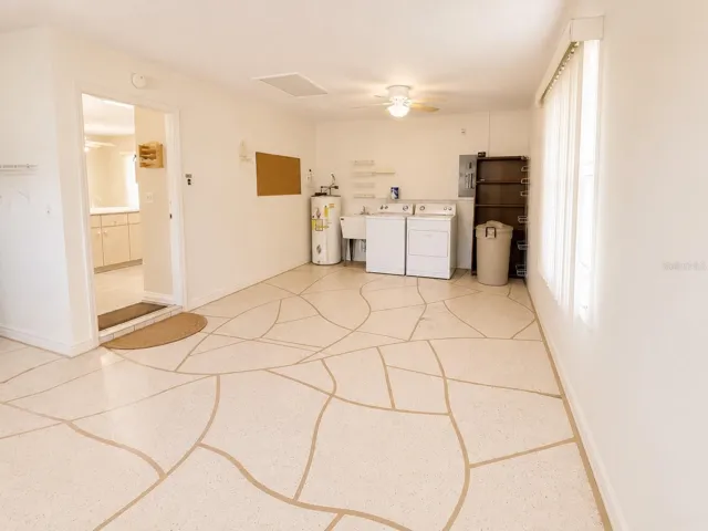 Garage, washer and dryer are located