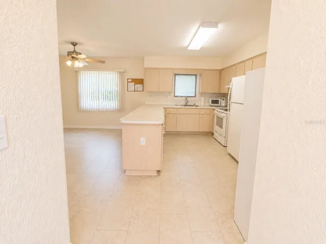 Front Entrance, you are greeted the kitchen and dinning room