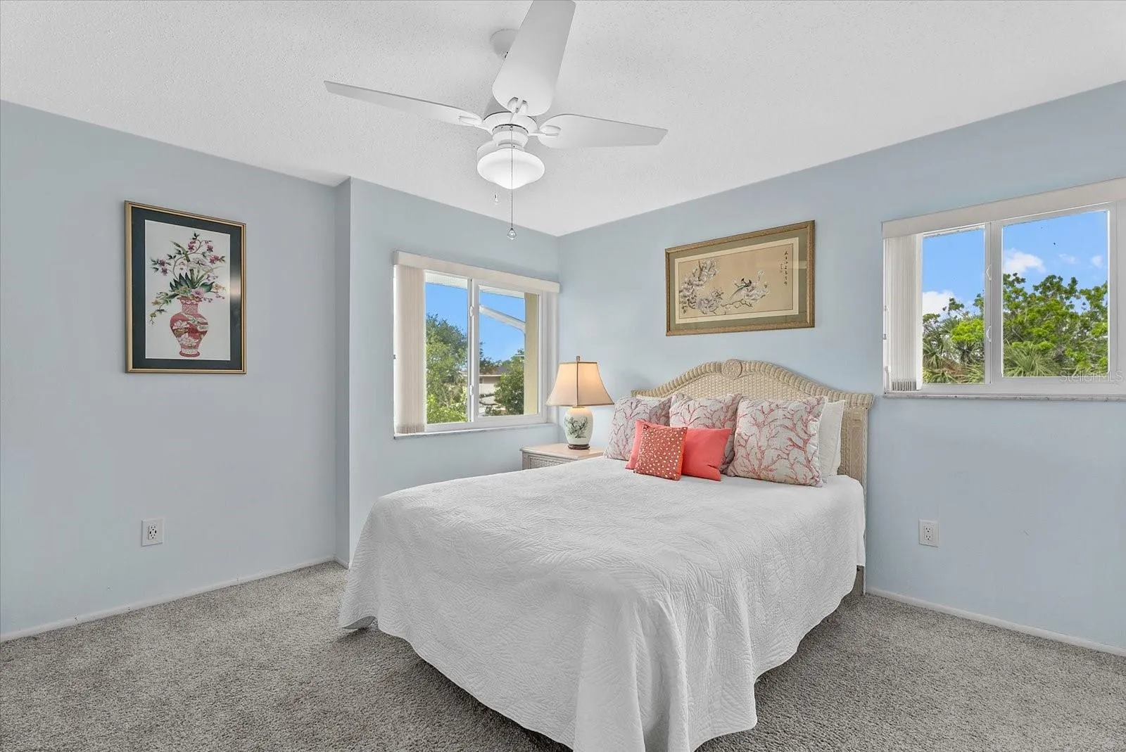 Primary bedroom with ensuite bathroom and water views!