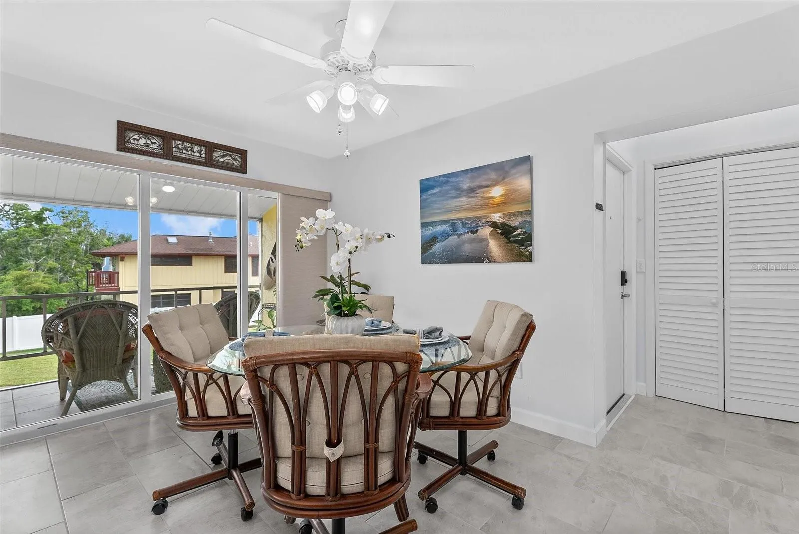 Dining room with a backdoor to the pool and kayak launch