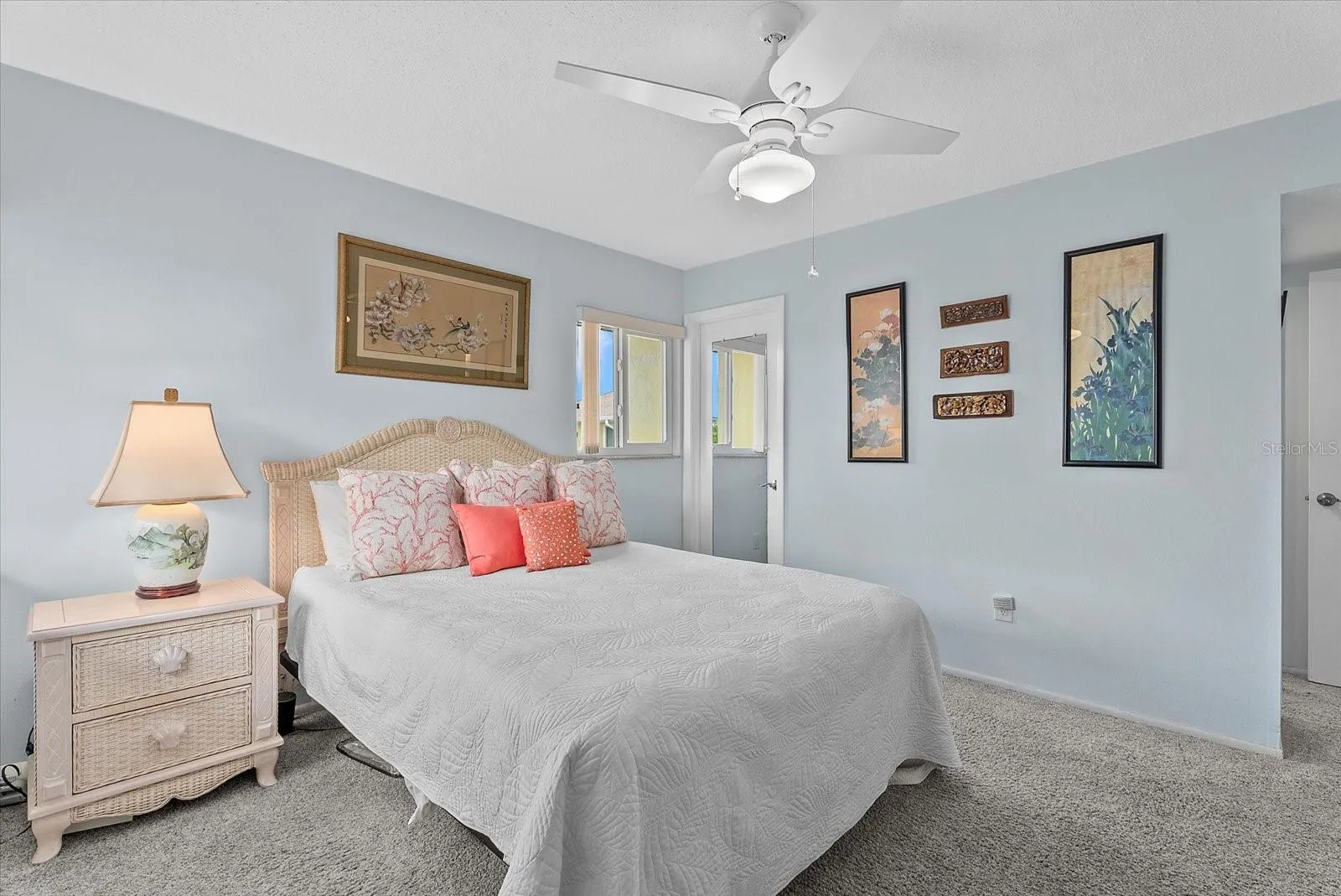 Primary bedroom with walk-in closet