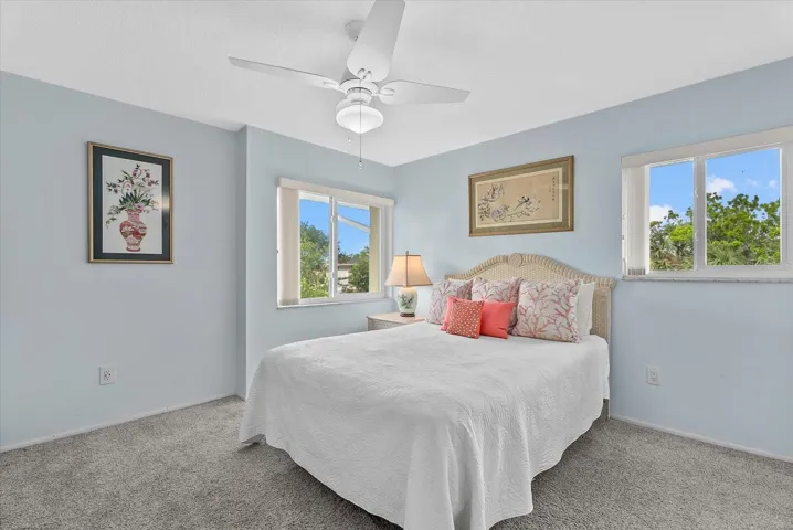 Primary bedroom with ensuite bathroom and water views!