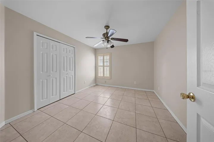 Bedroom with built-in closet