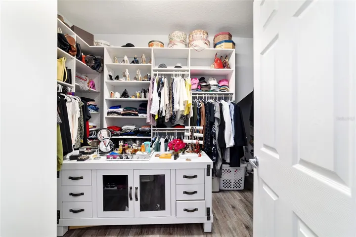 Primary wrap around walk in closet