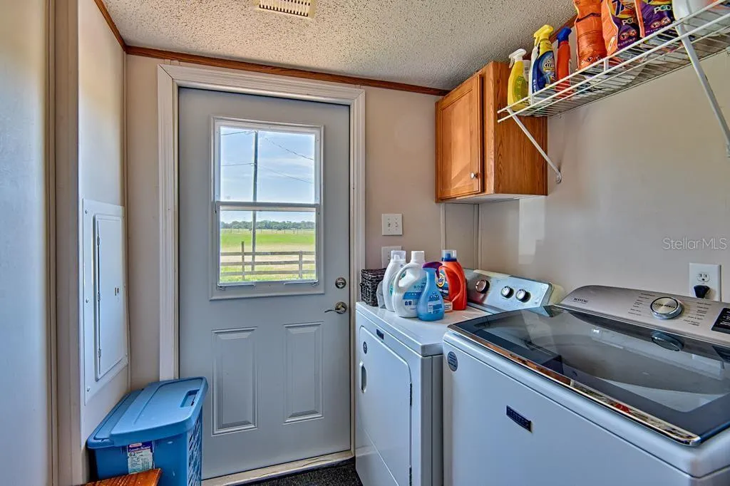 laundry room includes washer &amp; dryer