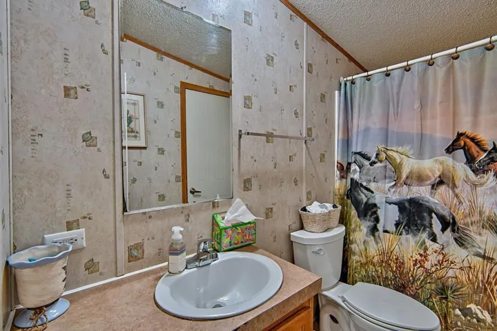 bathroom 2 also has entry into laundry room which exits to rear deck
