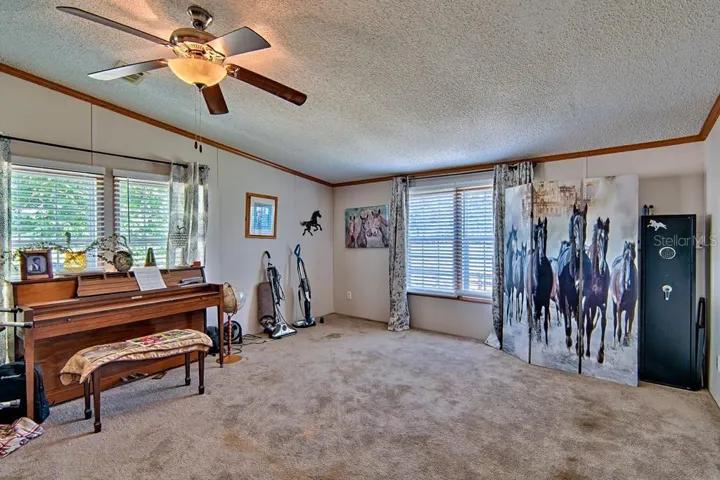 other half of family room includes piano