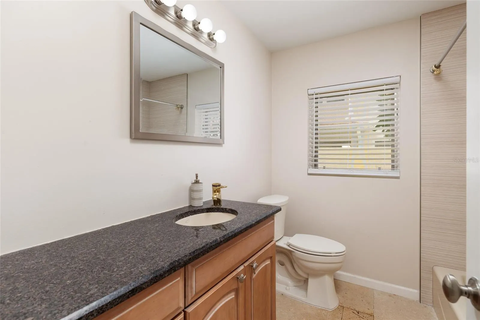 hall bathroom with bathtub and shower