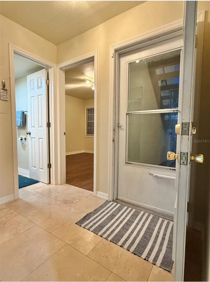 Just inside the entrance is a second bedroom and full bathroom.