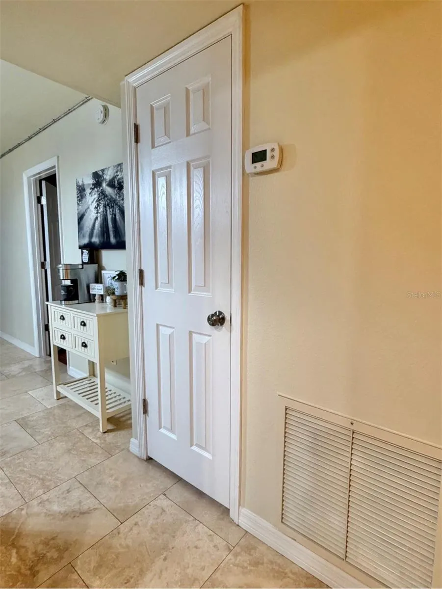 Just outside the kitchen are two closets/pantries.  There's another closet on the left.