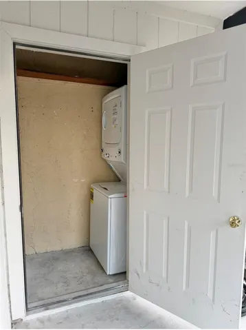 Utility Room with a brand new washer & dryer set are in the screened-in porch.