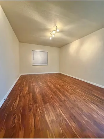 The primary bedroom is 16x11 and features LVP flooring, an updated ensuite, and a walk-in closet.
