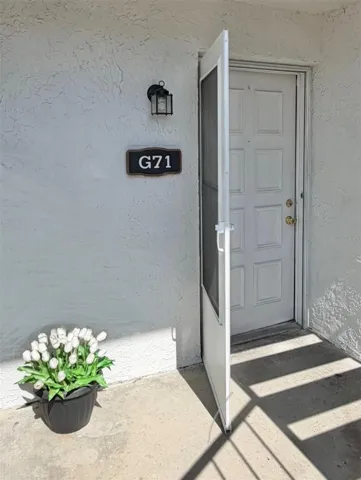 The front entryway is yours to decorate...a table & chair would be fun.