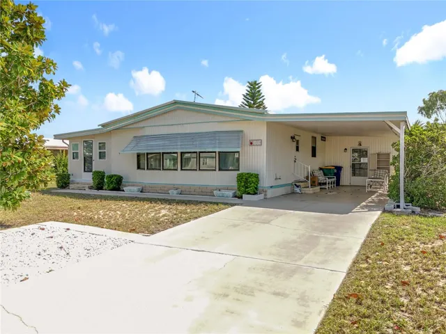 Front of Home with extra parking