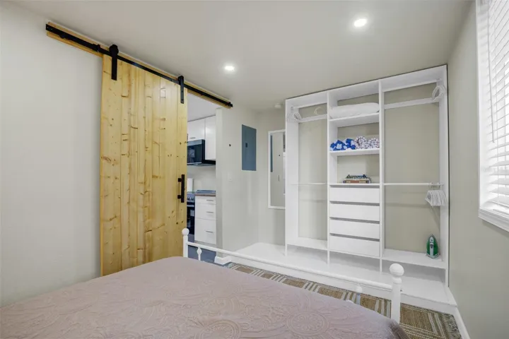 Downstairs bedroom with built in closets