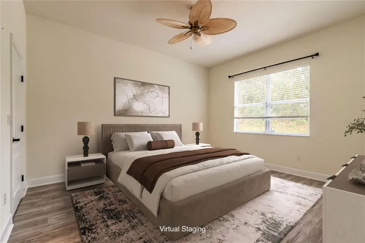 Staged photo - Primary bedroom - good size bedroom