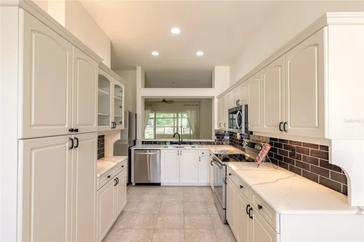Good size upgraded kitchen with stainless steel appliances and granite counter tops
