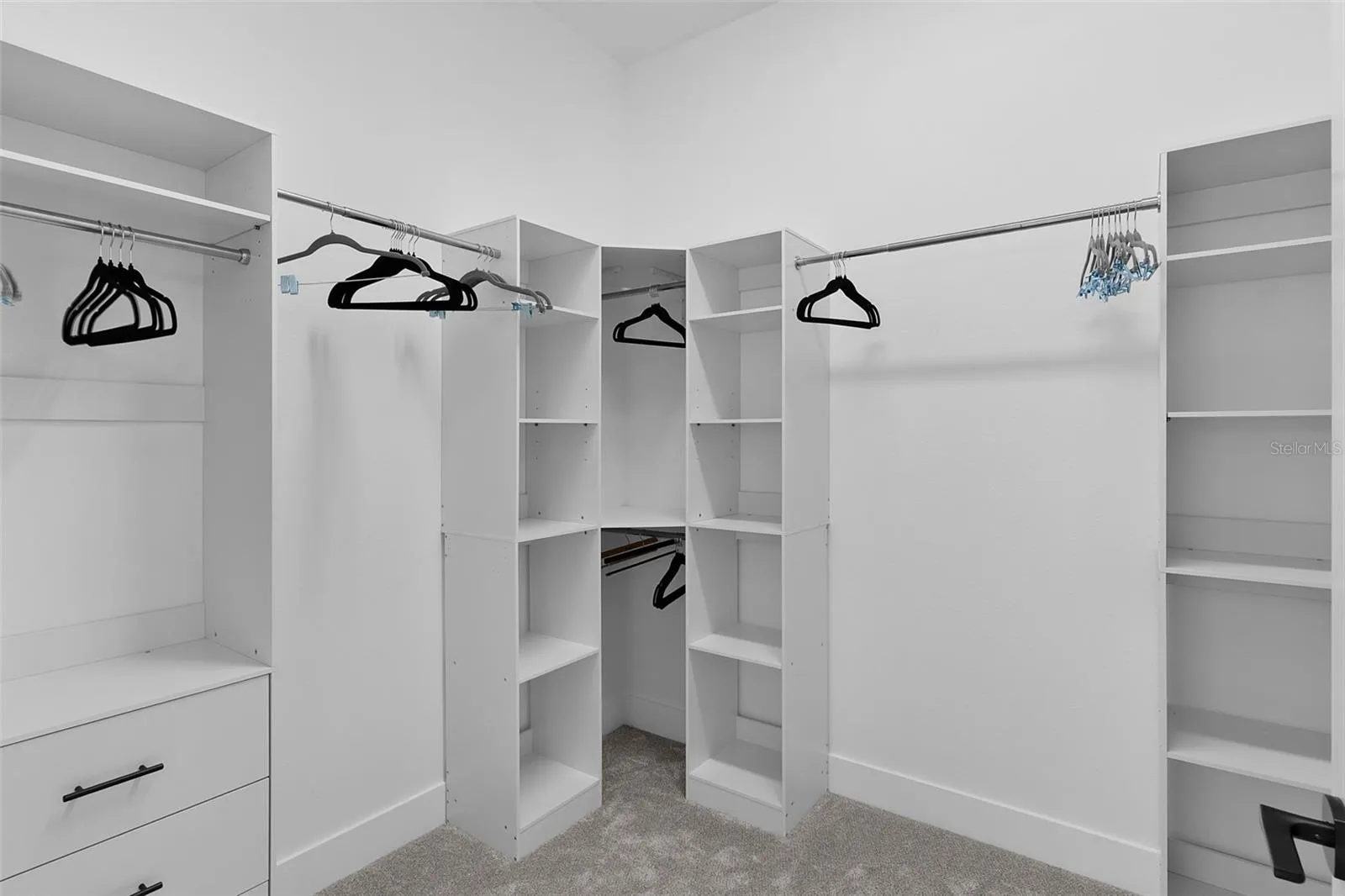 Large Walk-in closet with custom shelving