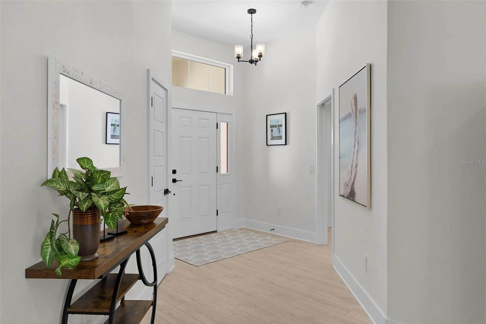 Foyer with 2 Guest Rooms through door on the left