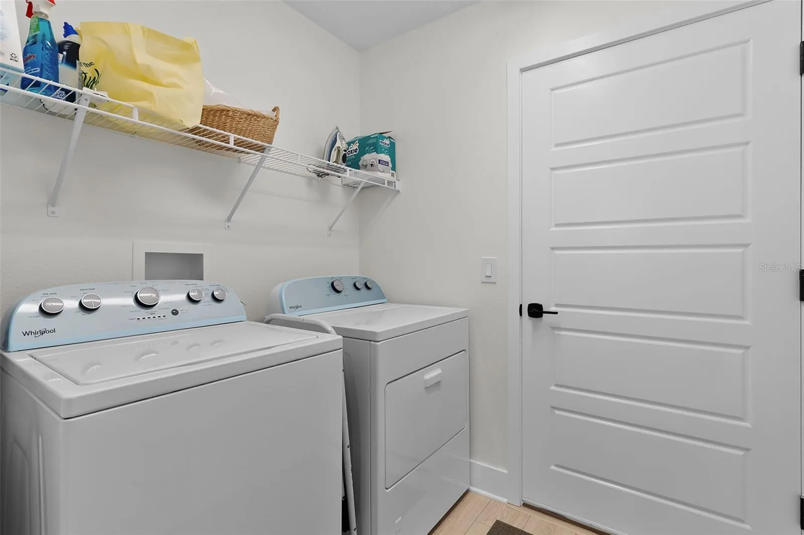 inside Laundry Washer and a Gas Dryer